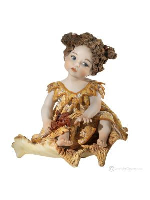 ÉTÉ Représentation des saisons en porcelaine.