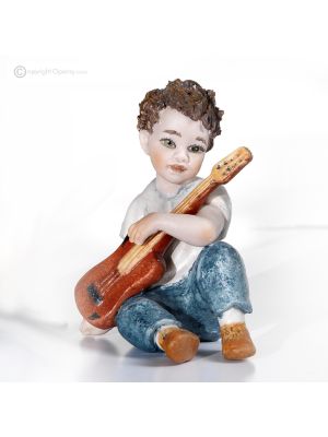 STEVE Musicien avec guitare Capodimonte, figurine en pure porcelaine.