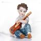 STEVE Musicien avec guitare Capodimonte, figurine en pure porcelaine.